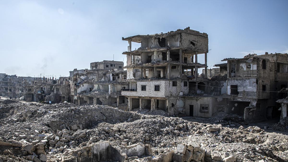 Edificios destruidos en el barrio de Tadamon, en el sureste de Damasco, donde aún viven algunas familias.